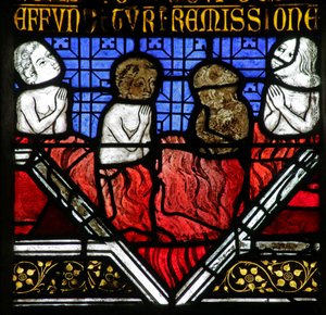 Fenster mit Darstellung der Seelen im Fegefeuer unter der Messe